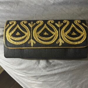 Elegant Black and Gold Clutch